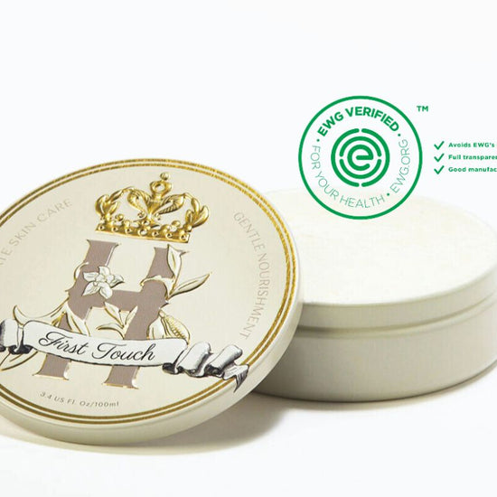 First Touch tin with its lid beside it and an EWG Verified badge